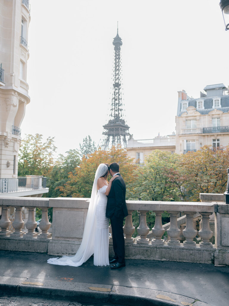 Married couple in a street with Eiffel Tower view
