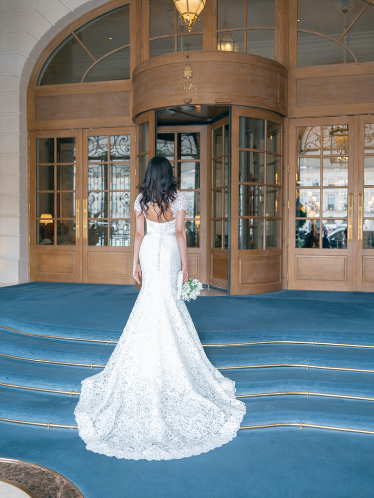 Bride photographed from behind in Ritz Paris