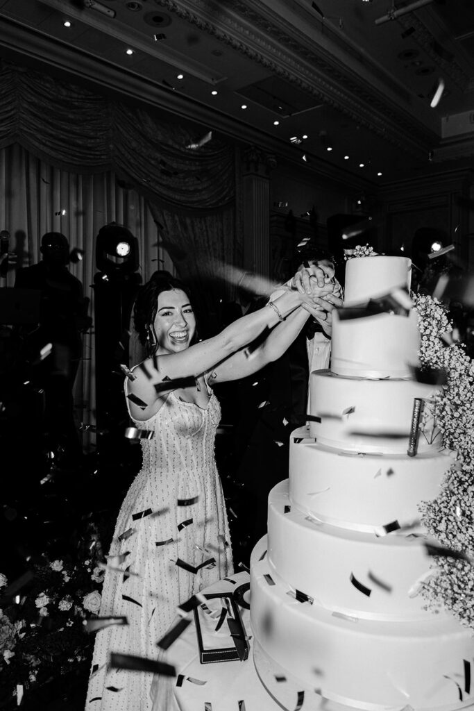 Bride cutting the wedding cake